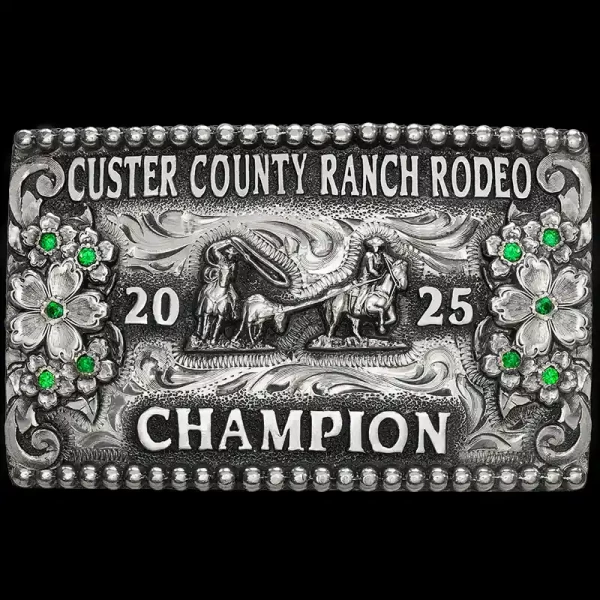 Our Westcliffe Belt Buckle features a hand-engraved German Silver base with detailed top and bottom bead edges, 10 flower accents with leaves, customizable cubic zirconia stones, and expertly hand-engraved Western inspired scrollwork. 

Size: 4.0” x 2.5